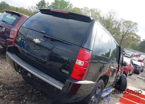 2009 Chevrolet Tahoe Ltz из США, поврежденный, VIN 1GNFK33019R215694